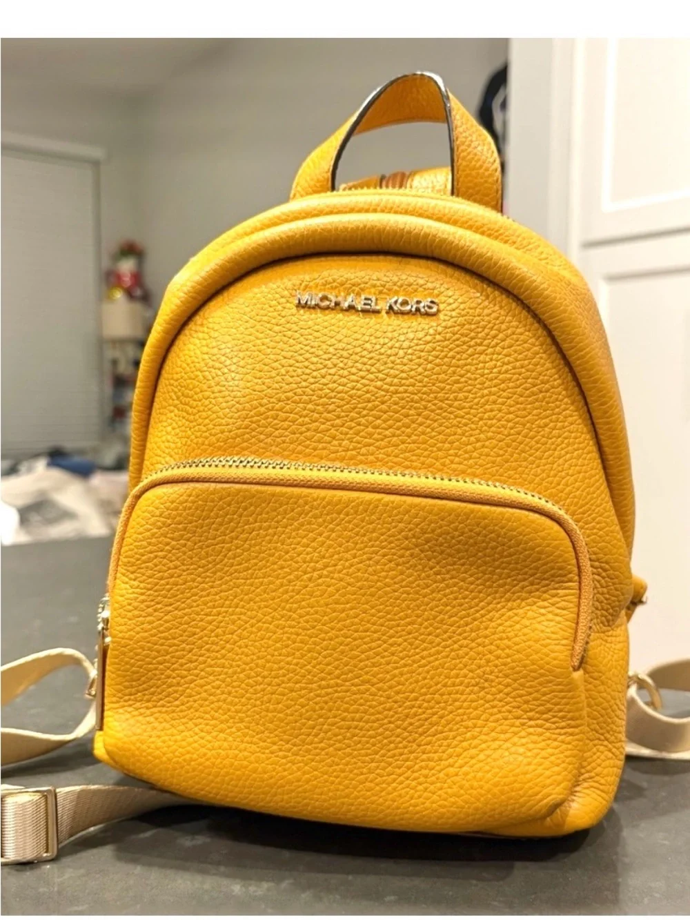 Michael Kors Mustard Yellow Pebbled Leather Mini Backpack